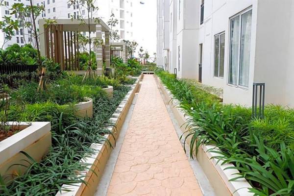 2 Bedrooms at Bassura City Apartment with Mall Access by Travelio