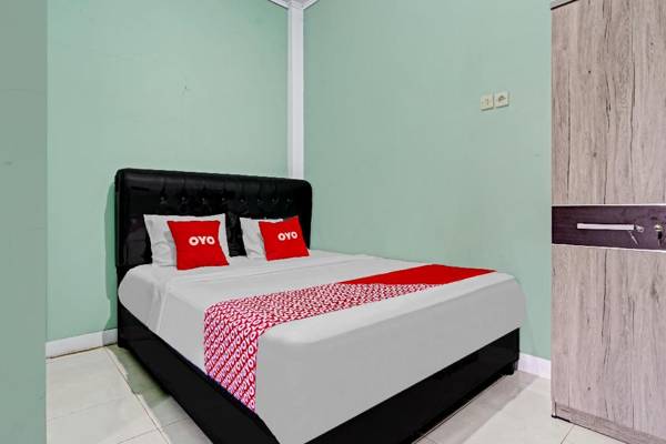 OYO 90571 Dewi Guest House Syariah