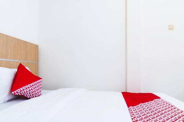 Vaccinated Staff - OYO 617 Sukaraja Residence Syariah