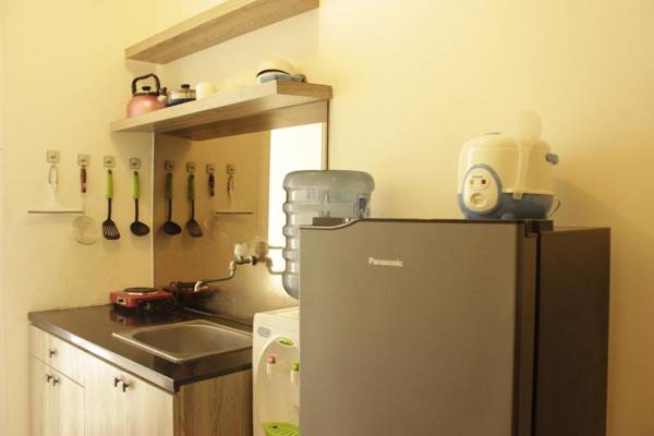 Homey 1BR @ Parahyangan Apt near UNPAR By Travelio