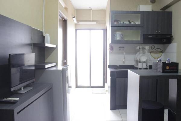 Cozy 2BR Apartment Gateway Ahmad Yani By Travelio