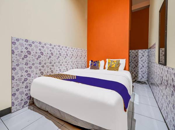 SPOT ON 91186 Losmen Yanti