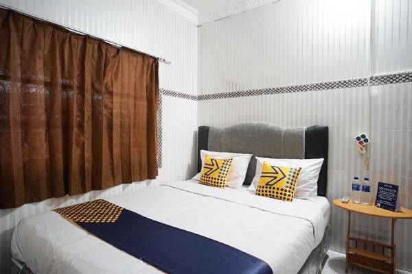 SPOT ON 1854 Sepinggan Asri Syariah Guesthouse