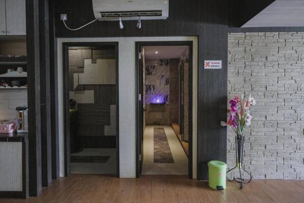 RedDoorz Plus near Pantai Coastarina 2