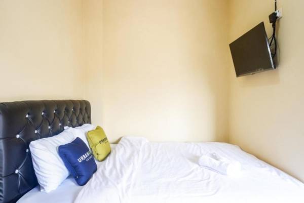 Urbanview Hotel Telu Wolu Monjali