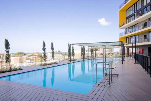 Luxury Beach Apartment with Pool & Gym By Airsuite