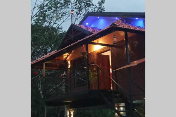 Sansree's Puzhakkal Riverview Cottage