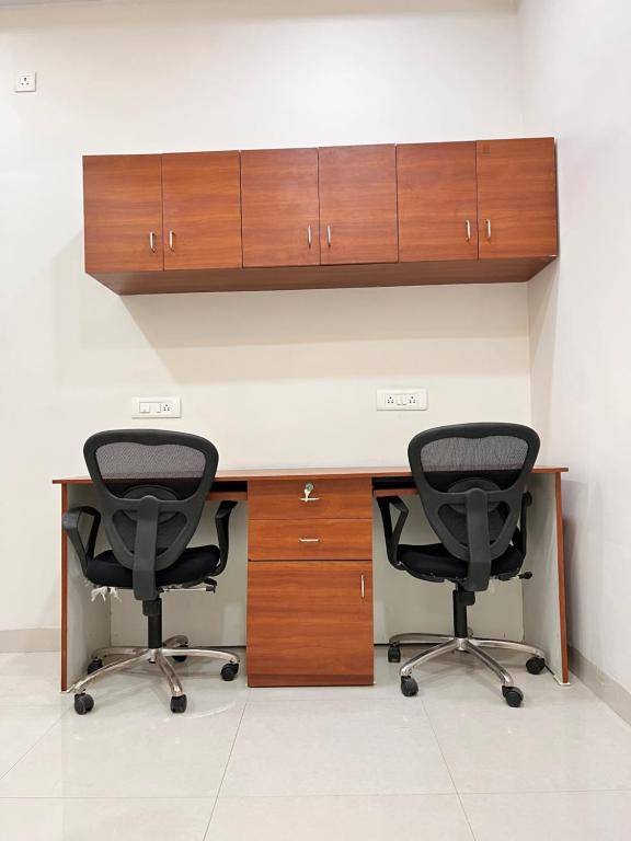 Workspace - Minimalist 3BHK Flat in Central Raipur with Office Space