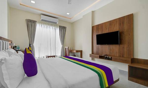 Treebo Tryst Ratnam By Vasudha Hotels