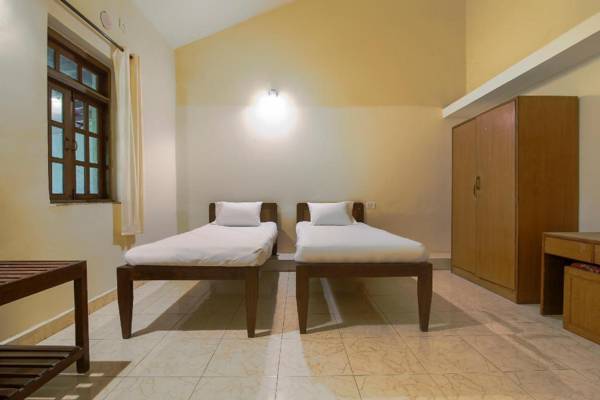 SPOT ON 18436 Palmgrove Residency