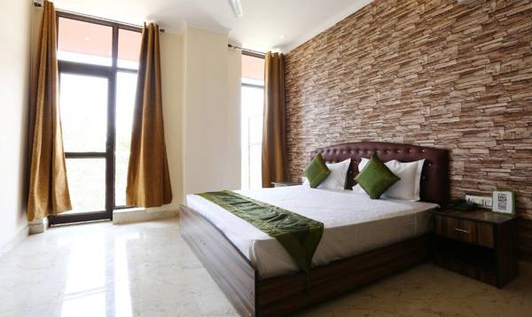 Treebo Trend Blessing Bells Ballupur Chowk