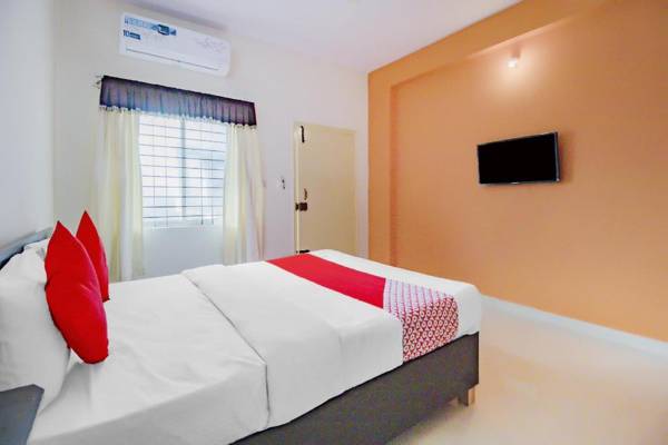 OYO 77067 P N K Suites