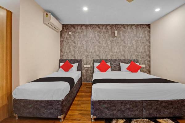 OYO 81386 Dhanvitha Suites