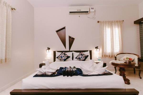 Square Rooms - An Athulya Hotel