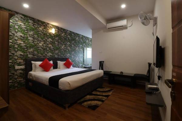 Hotel Dhanvitha Suites