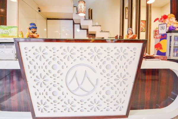 Capital O 69624 Hotel Moments Inn