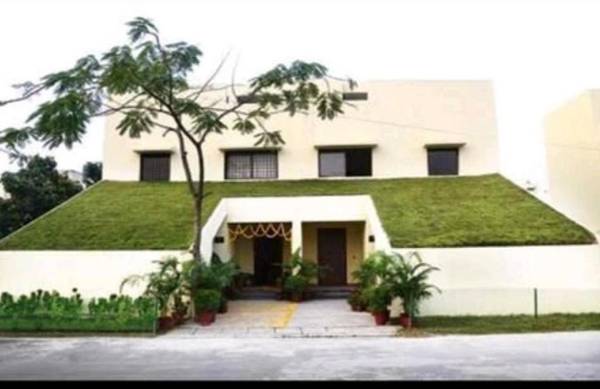 Vedic village-aqua villa with rooftop pool access.