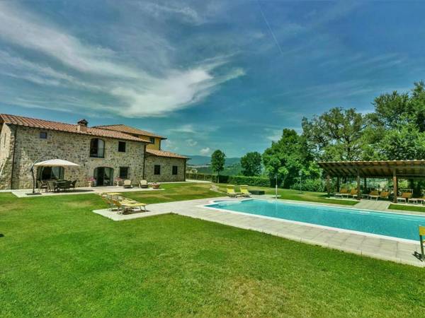 Luxury villa with pool and beautiful garden on an estate