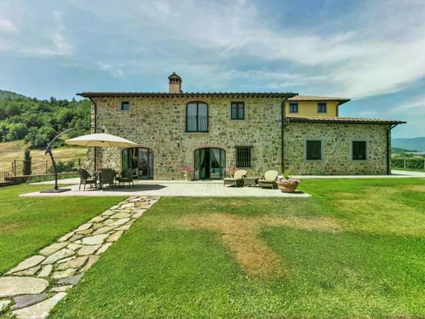 Luxury villa with pool and beautiful garden on an estate