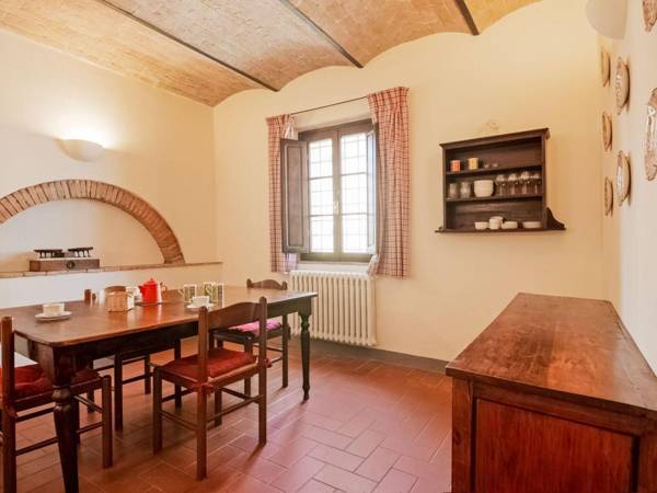 small village of beautiful apartments in the green Tuscan hills and olive groves
