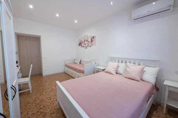 Casa Rosa Beige e Blu