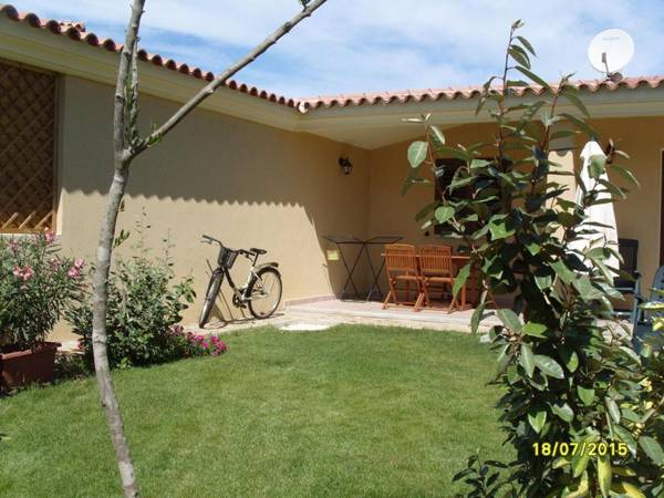 CASADELFARO con Giardino a Pittulongu 600Metri dalla Spiaggia