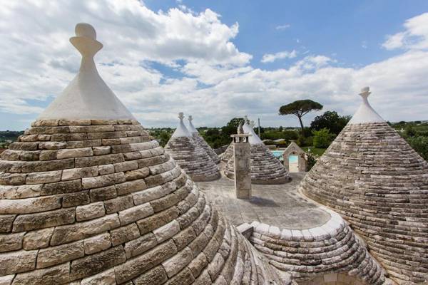 Trulli in ancient farm with pool