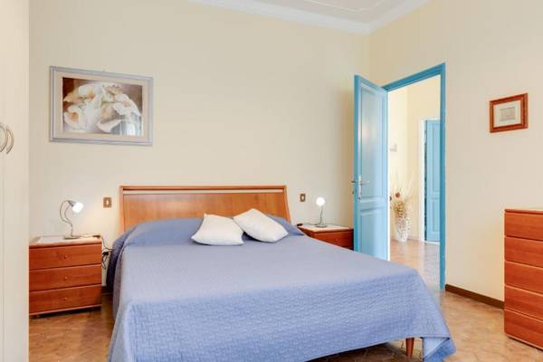 Splendido appartamento con giardino e 3 posti auto