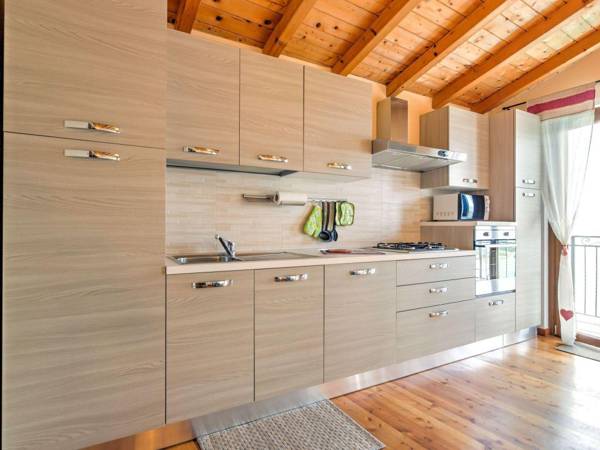 Modern Holiday Home with Swimming Pool in Gravedona