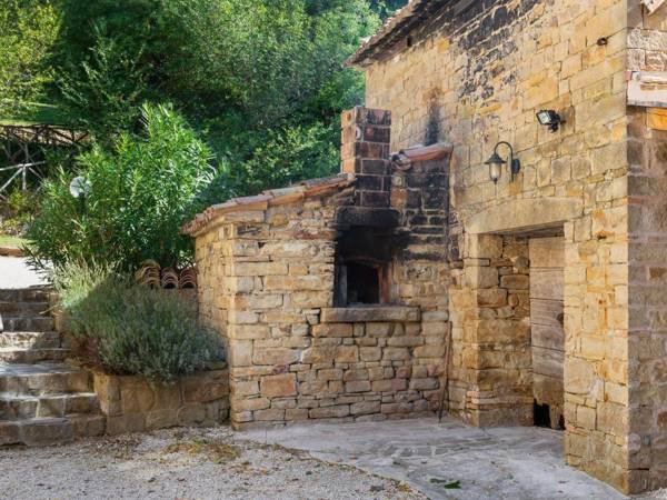 Villa Carina is a converted farmhouse set in about a hectare of gardens orchard and woods.