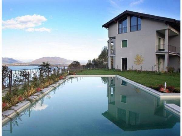 Cozy Apartment with Swimming Pool in Meina Italy