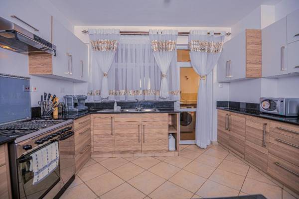 Sebuleni Luxury Apartment by Homes by Della