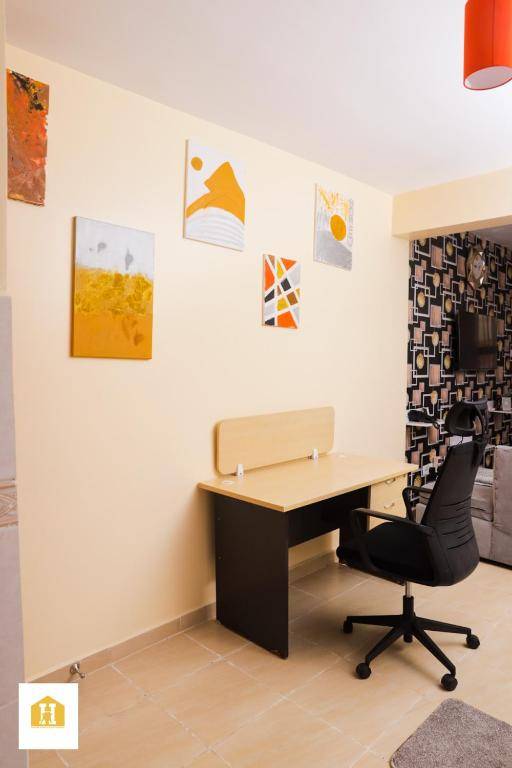 Workspace - ALIFA HOMES-COZY APARTMENT