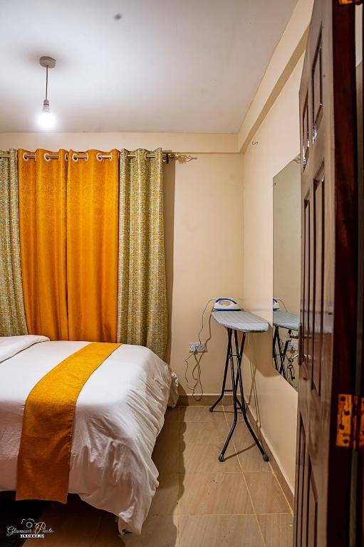 STYLISH 1BR APARTMENT IN KISUMU: FAST WI-FI NETFLIX SECURE PARKING