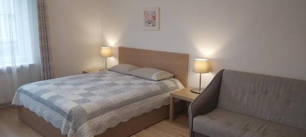 Apartamentai šalia baseino