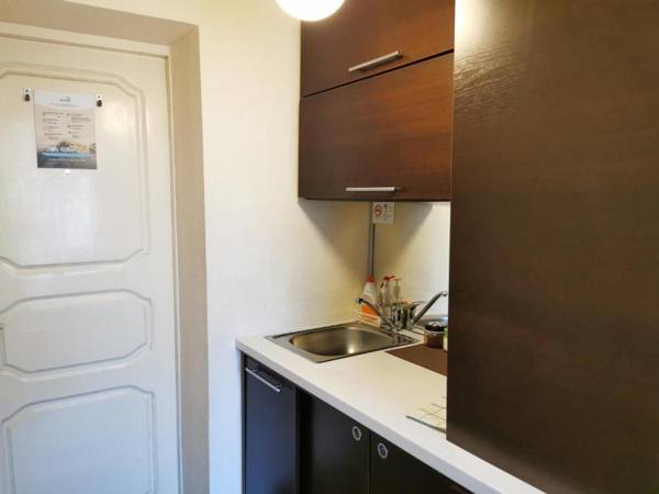 Orange studio with balcony