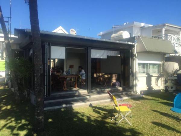 3 bedrooms house at Trou aux Biches 50 m away from the beach with sea view furnished garden and wifi