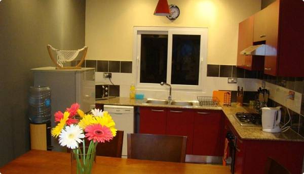 Althea's nice comfy 4 BR townhouse with pool in Grand Bay- AH 1