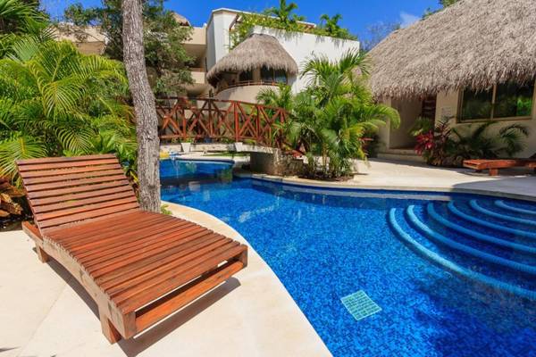 Condos Perfectly Situated Between the Beach & Tulum Town by Moskito