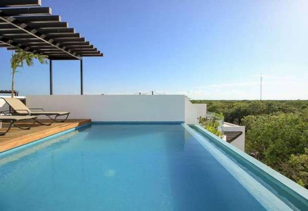 New And Fully Equipped 2 Br Apartment in Aldea Zama - Qs17