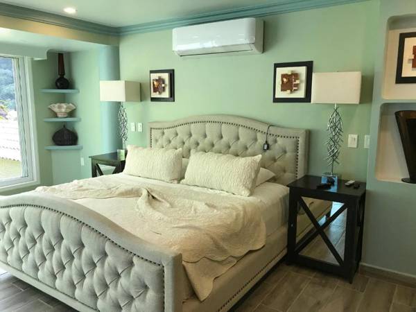 Room in Guest room - Private Suite with garden swimming pool and ocean views
