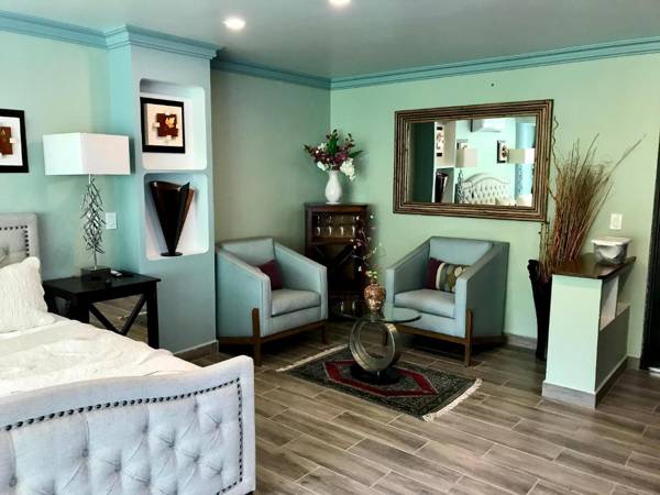 Room in Guest room - Private Suite with garden swimming pool and ocean views