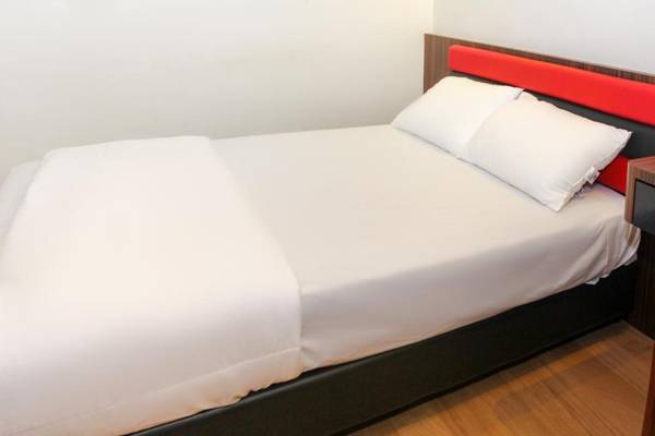 OYO 90027 Happy Hotel