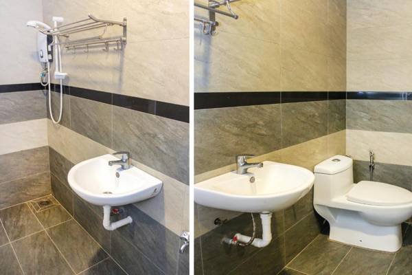 OYO 90027 Happy Hotel