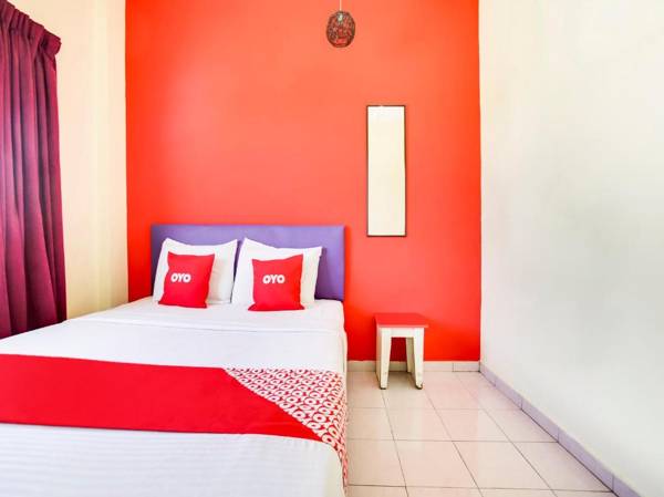 OYO 89615 T Family Hotel