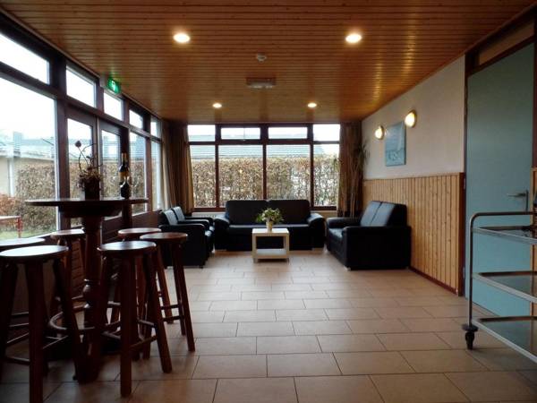 Tidy house with fireplace near North Sea beach