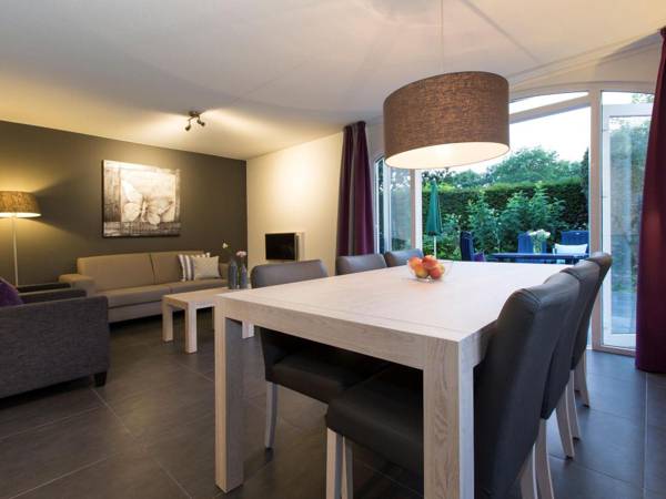 Luxurious villa with washer and dishwasher in a green area