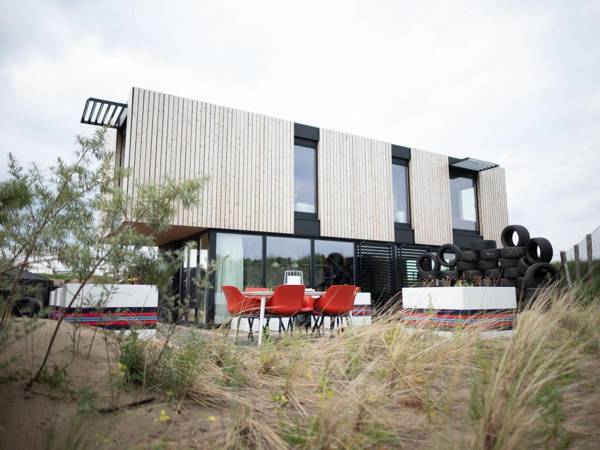 Modern trendy F1 theme lodge just 100 m. from the sea
