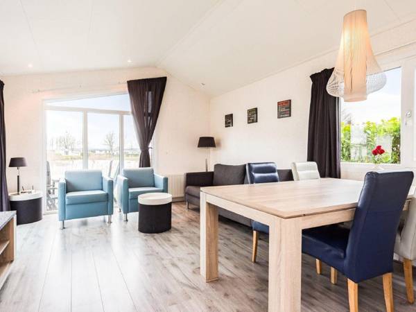 Well furnished chalet with microwave in a water-rich area