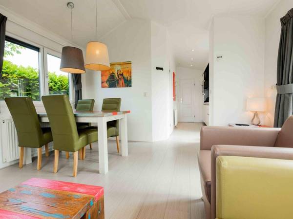 Well furnished chalet with garden in a water-rich area